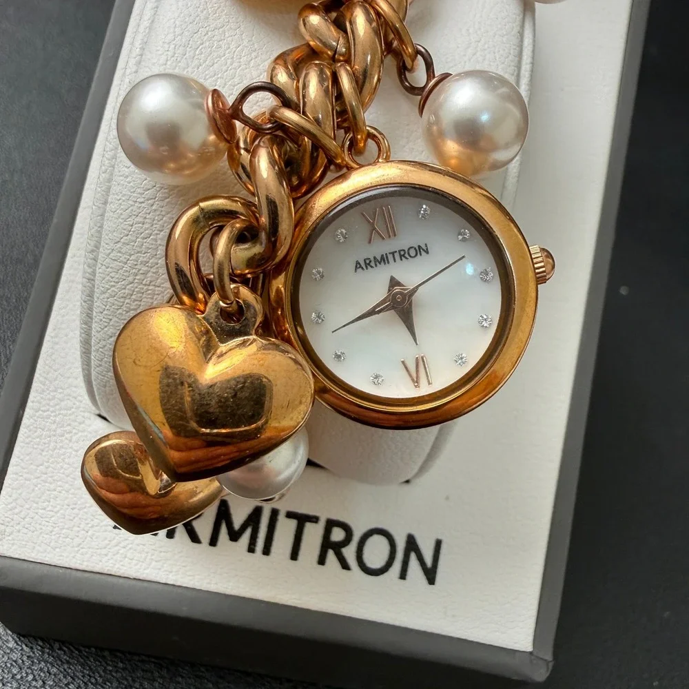 MSRP‎ $90 Armitron 75/5578RG Women's Rose Gold Tone Charm Crystal Watch New Batt